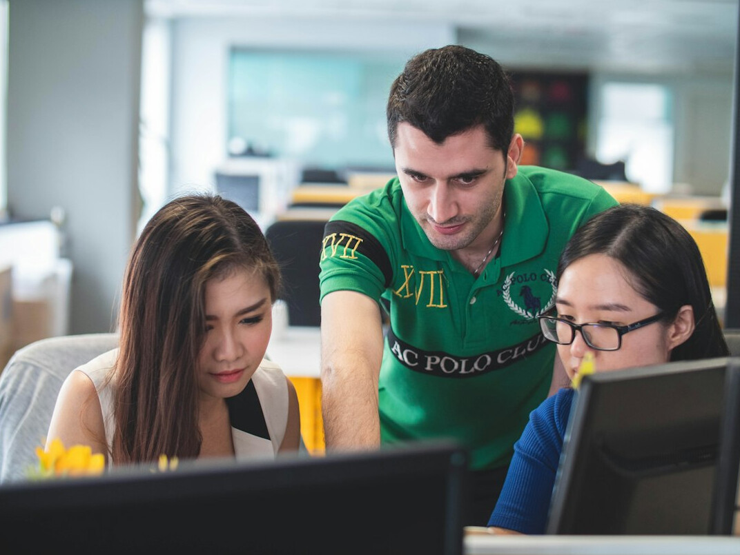 instructor helping student with code