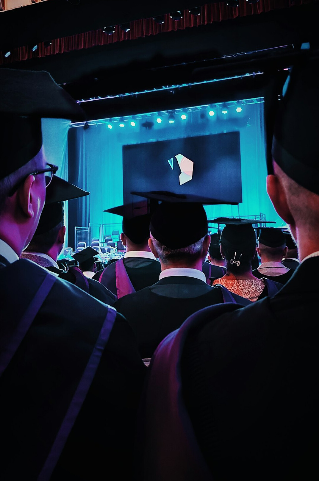 graduation cap and laptop