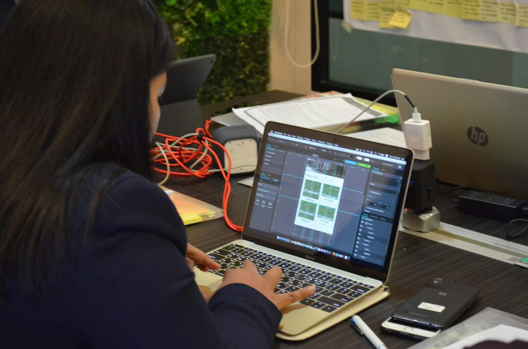 student completing coding project