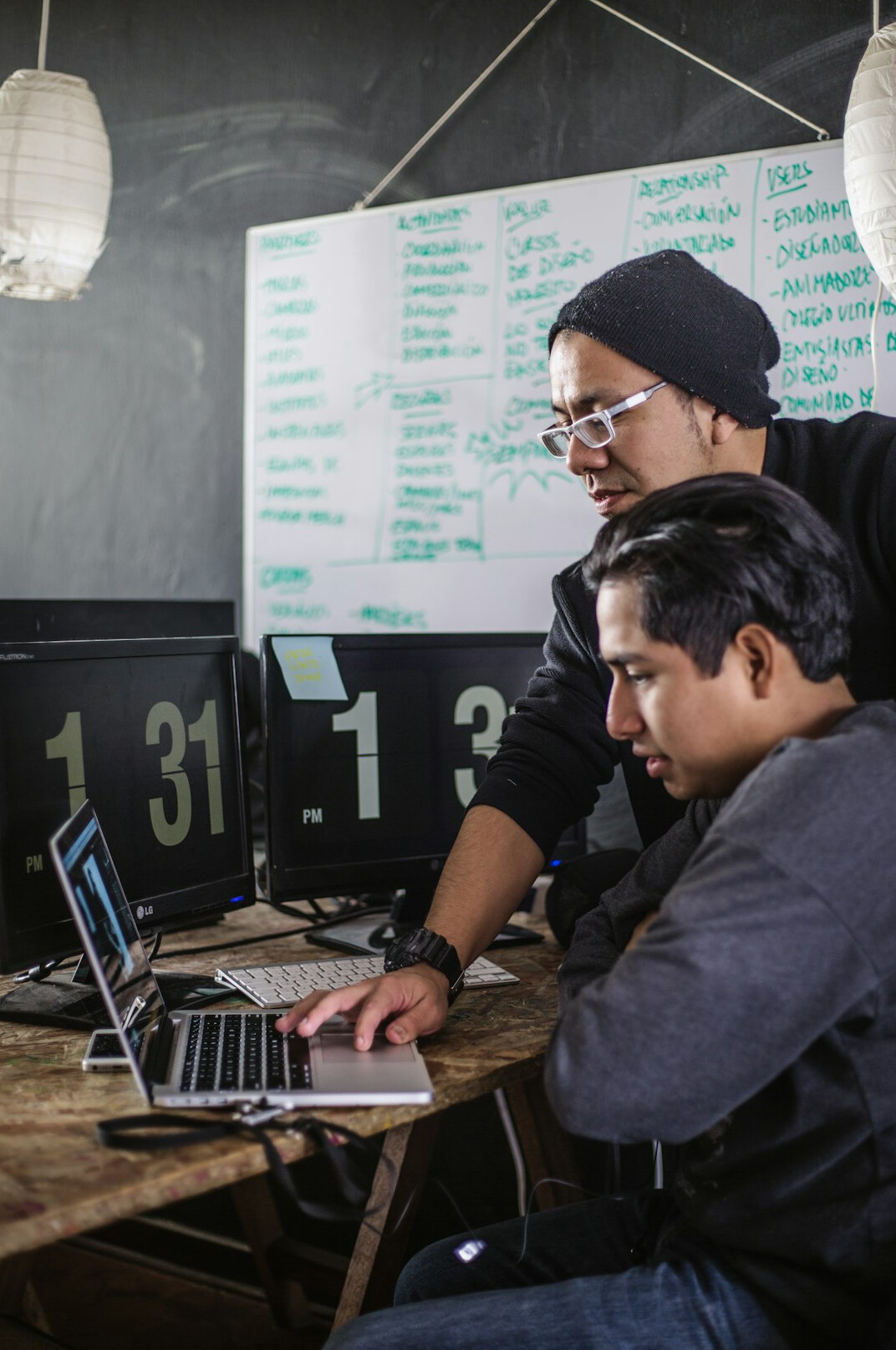 team discussing code together